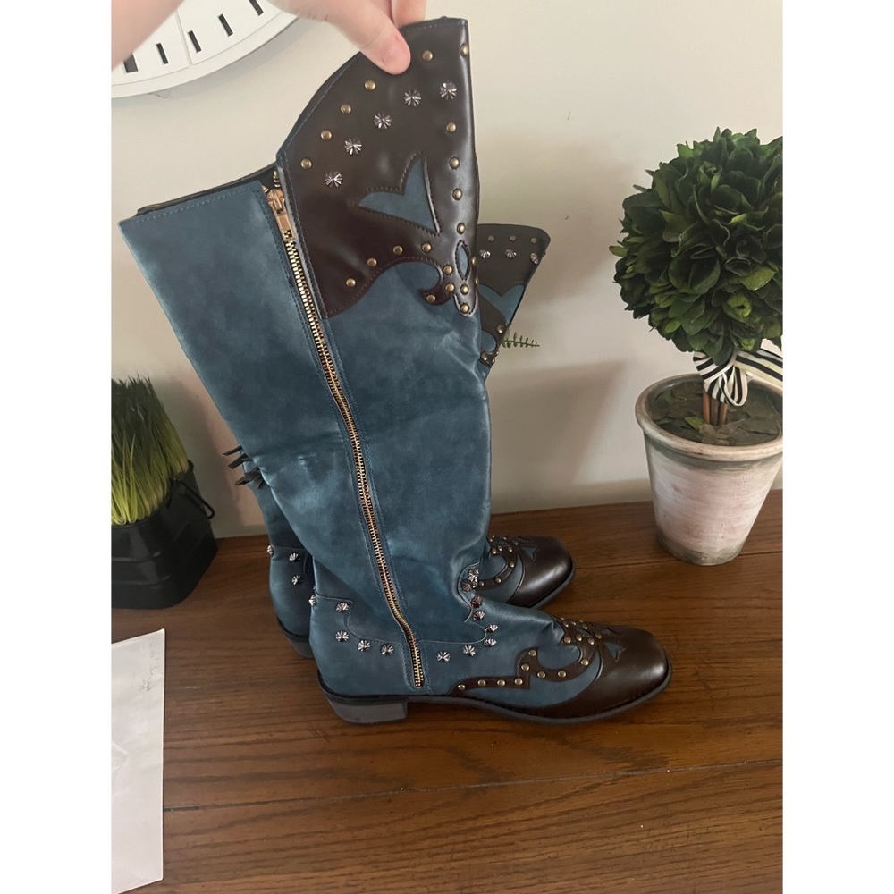 Boutique boots. Brand new. Never worn!